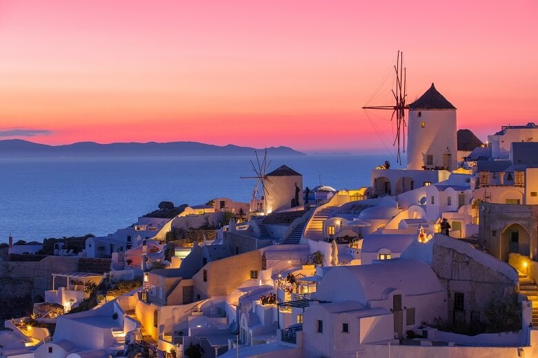 Houses in Santorini looking over sunset