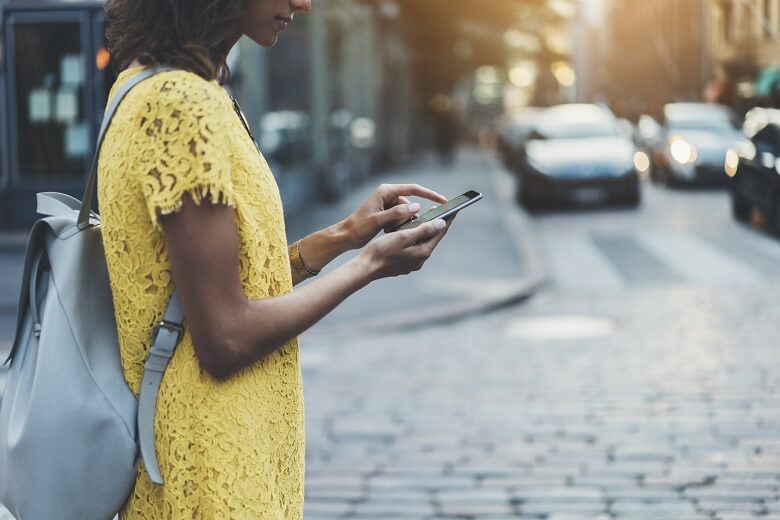 Lady on her phone in the street